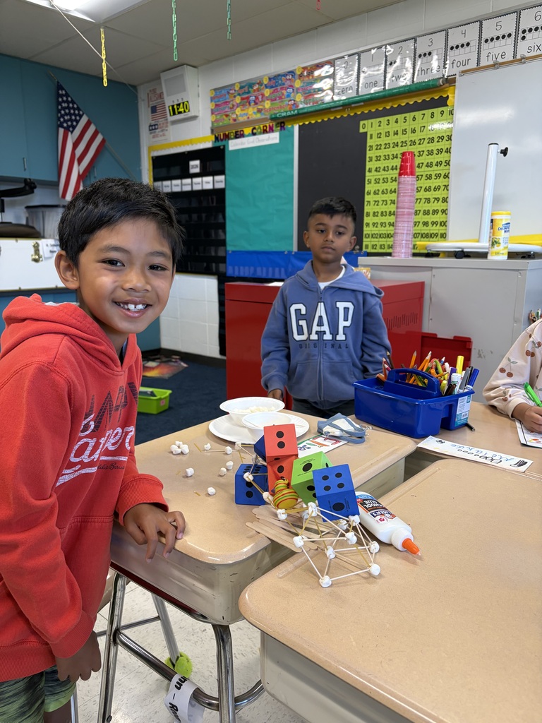 Students work together on a STEM challenge