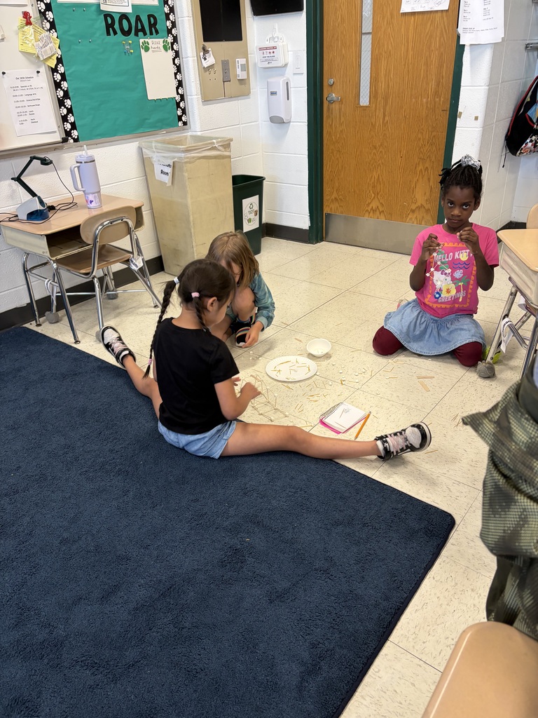 Students work together on a STEM challenge