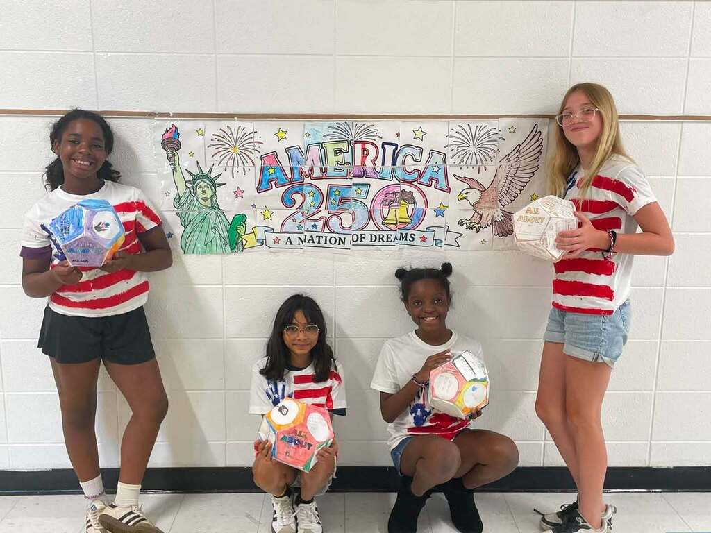 Four Student smiling