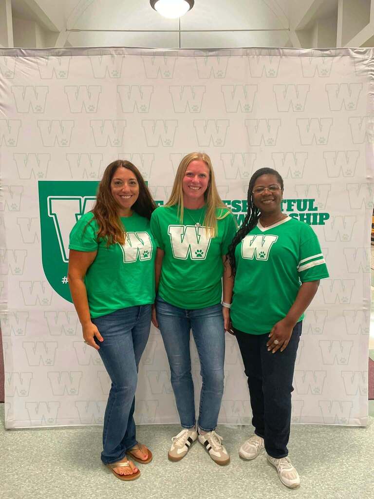 Tech Integration specialists smiling 