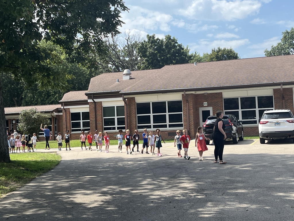 Students practice exiting the school during a fire drill
