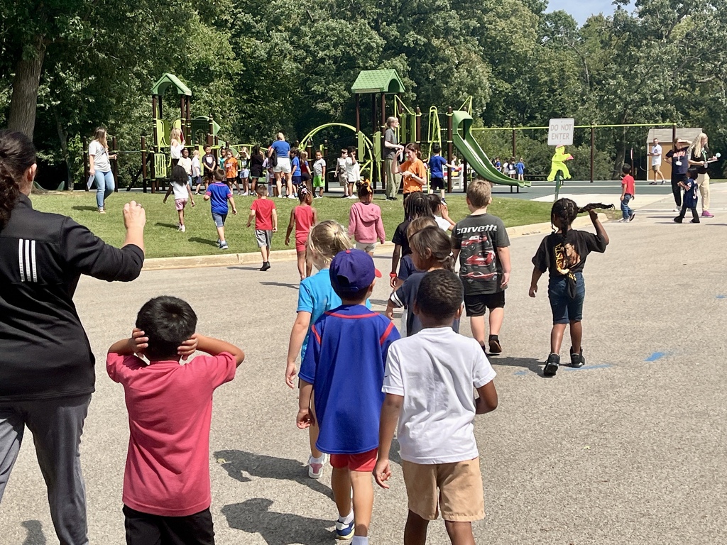 Students practice exiting the school during a fire drill