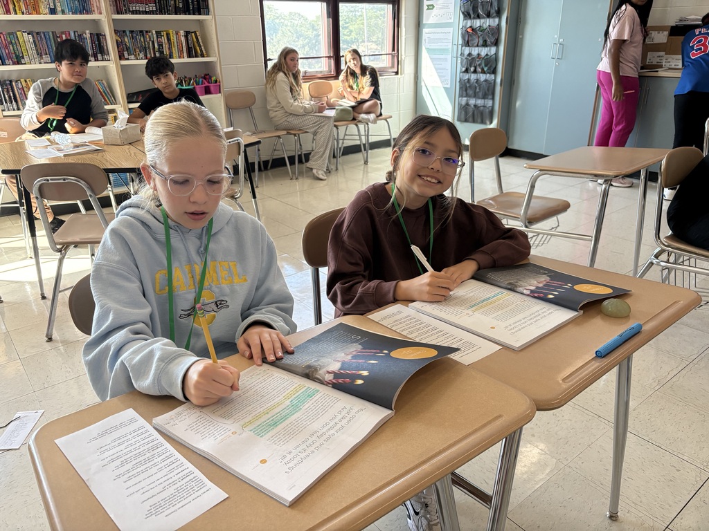 Students work in pairs to annotate a short story at WMS