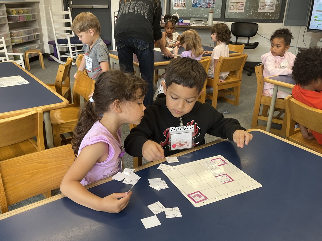 Kindergarten students learn a coding at Woodland Primary