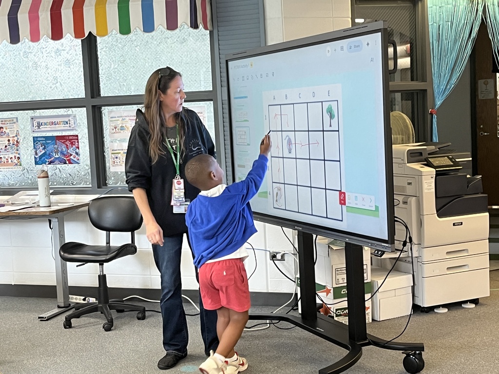 Kindergarten students learn a coding at Woodland Primary
