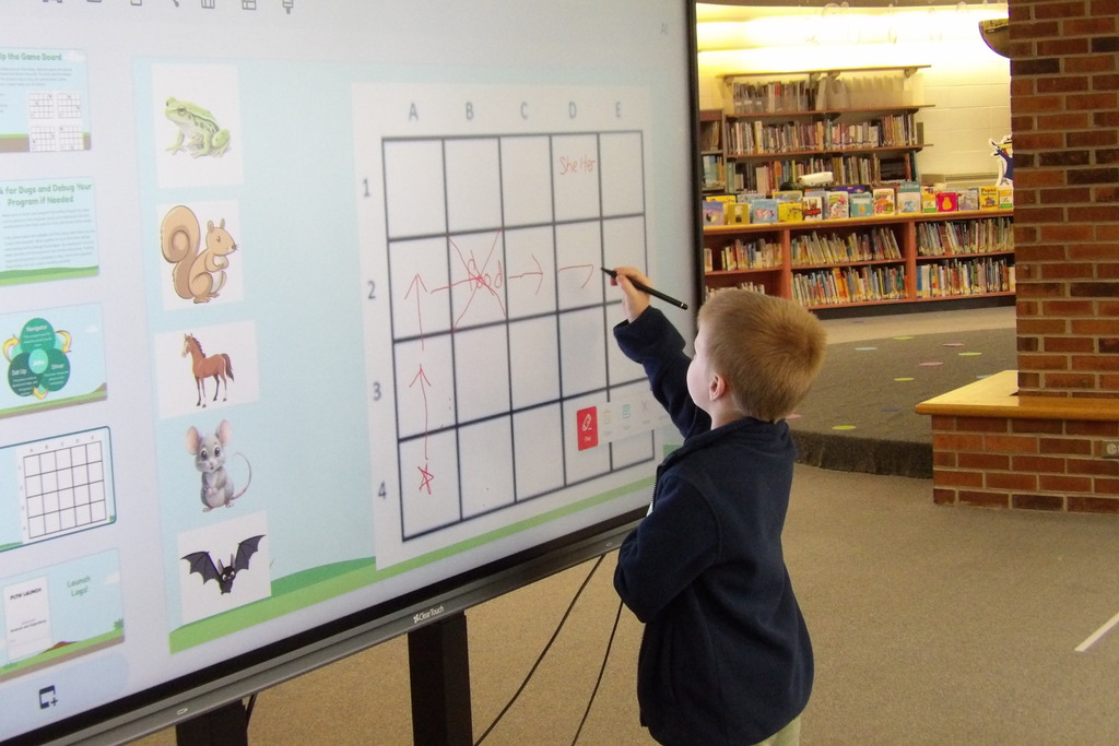 Kindergarten students learn a coding at Woodland Primary