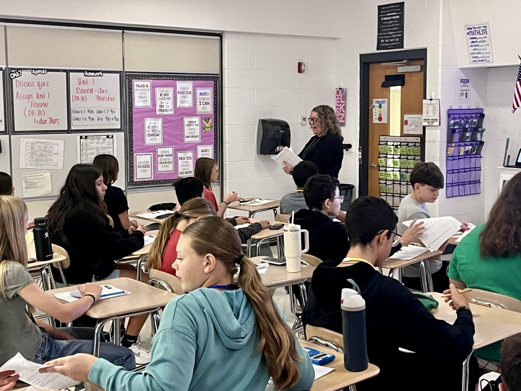 7th Grade Challenge Math students work in groups to prepare for a test in Ms. Olekszy's class