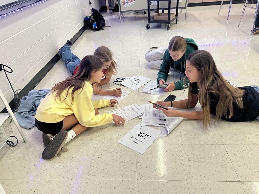 7th Grade Challenge Math students work in groups to prepare for a test in Ms. Olekszy's class