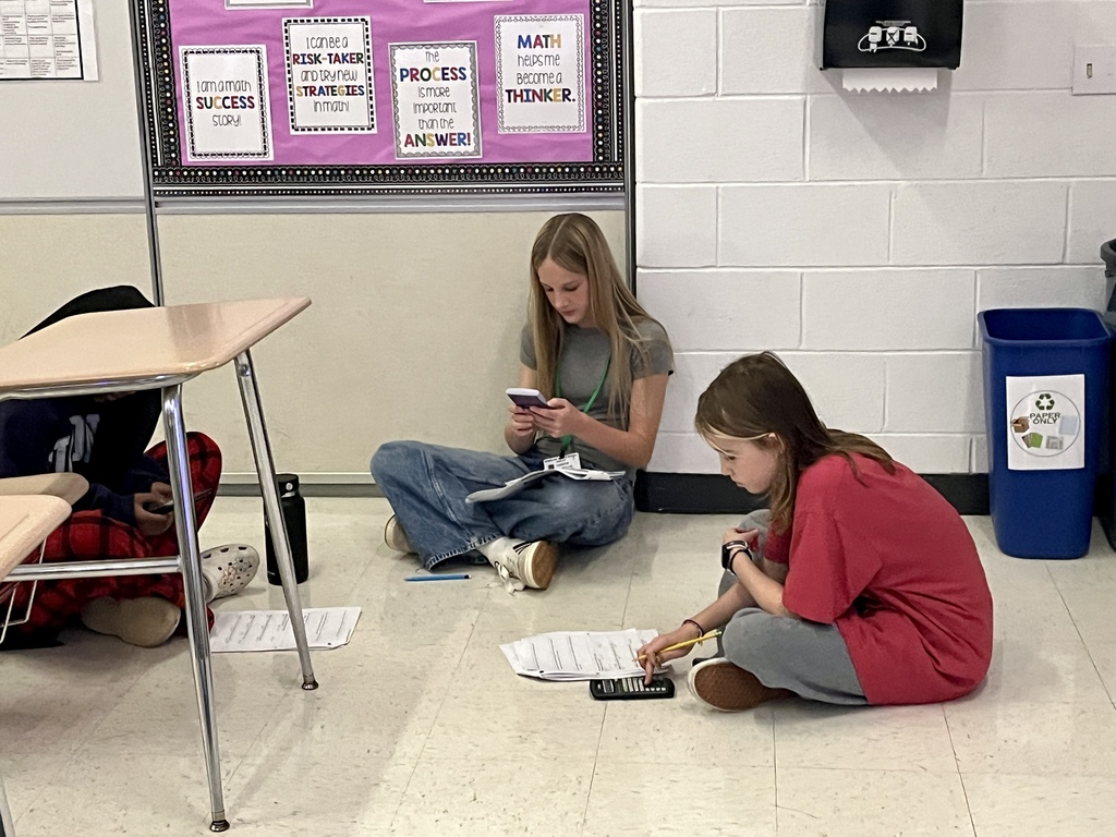 7th Grade Challenge Math students work in groups to prepare for a test in Ms. Olekszy's class