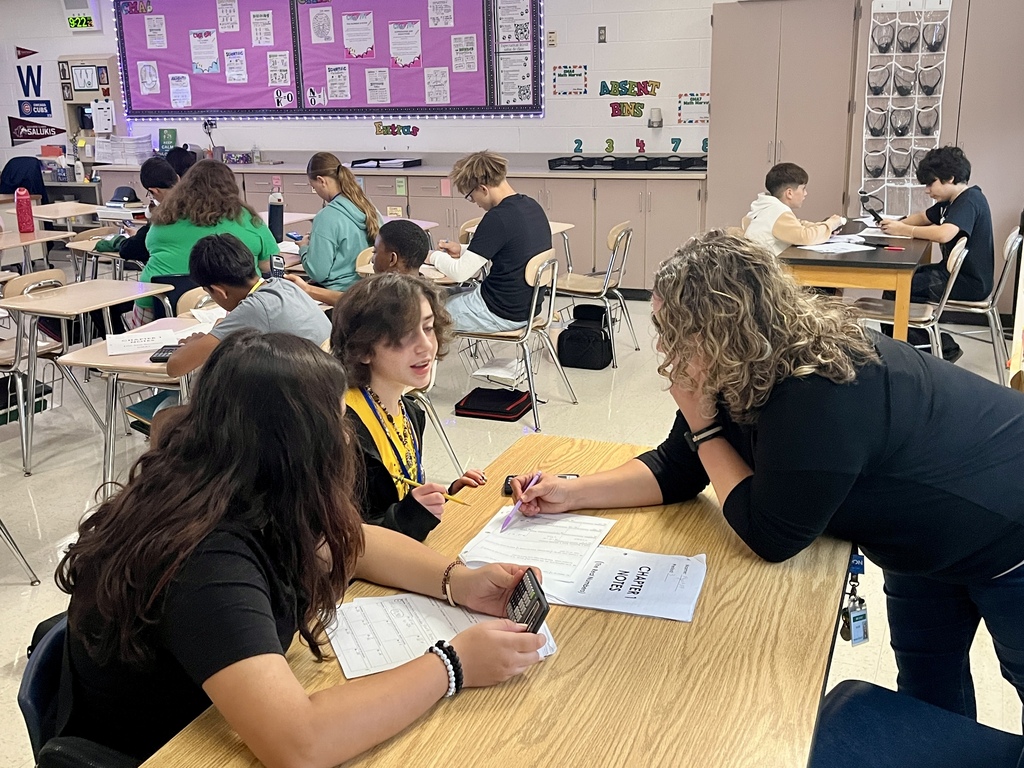 7th Grade Challenge Math students work in groups to prepare for a test in Ms. Olekszy's class