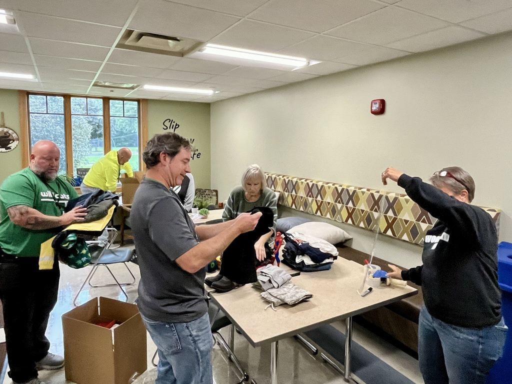 The district office team packing donations during District Day of Service, Sept. 2026