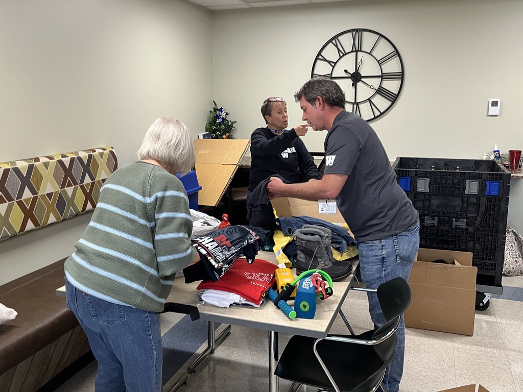 The district office team packing donations during District Day of Service, Sept. 2026