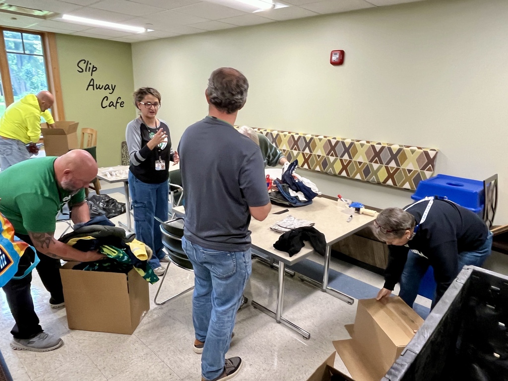 The district office team packing donations during District Day of Service, Sept. 2026