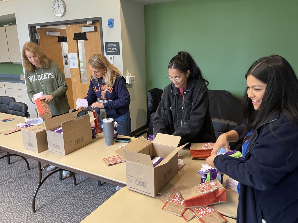 The district office team packing donations during District Day of Service, Sept. 2026