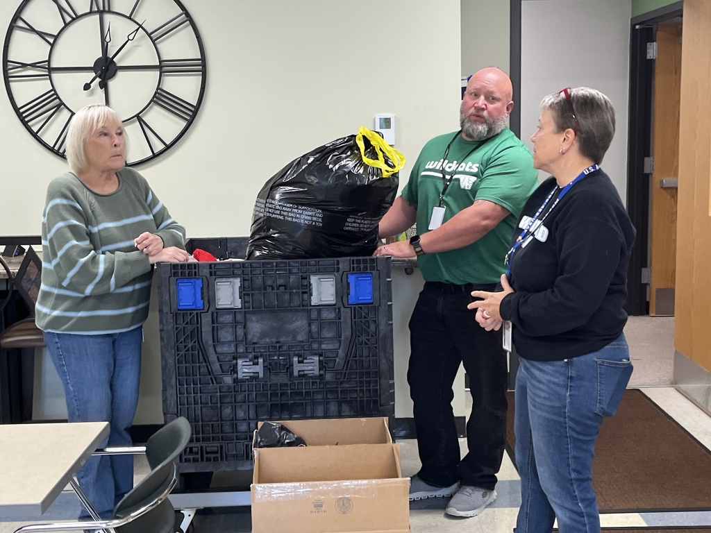 The district office team packing donations during District Day of Service, Sept. 2026