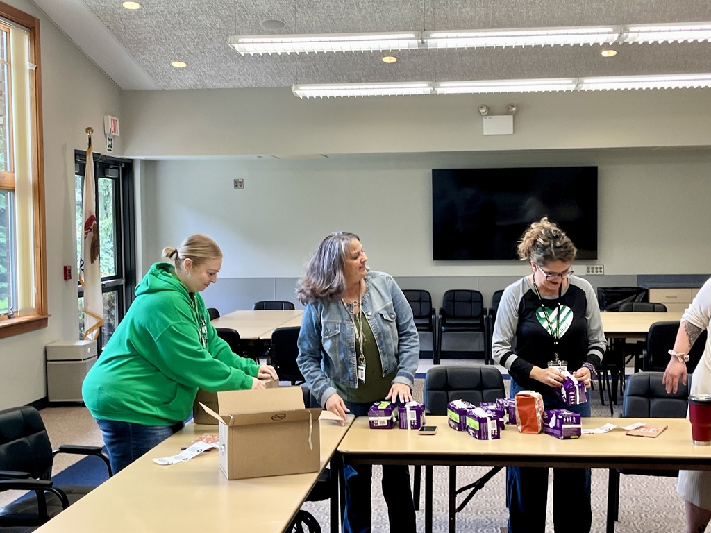 The district office team packing donations during District Day of Service, Sept. 2026
