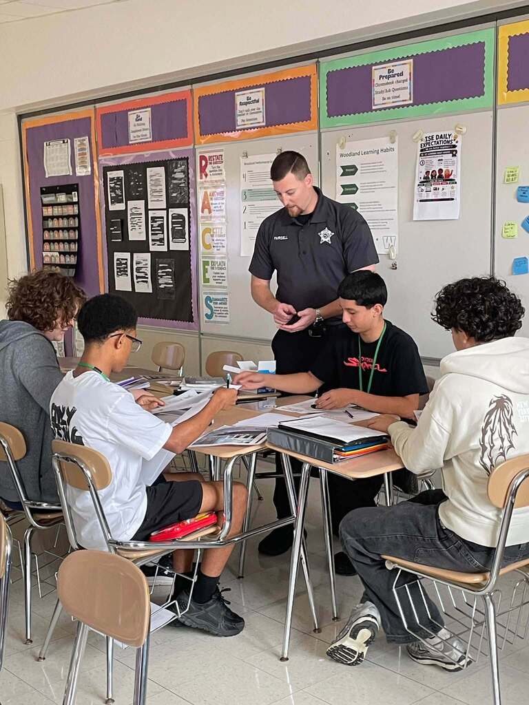 Students in Ms. Wakefield's class working the Dets. Hansen and Parsell
