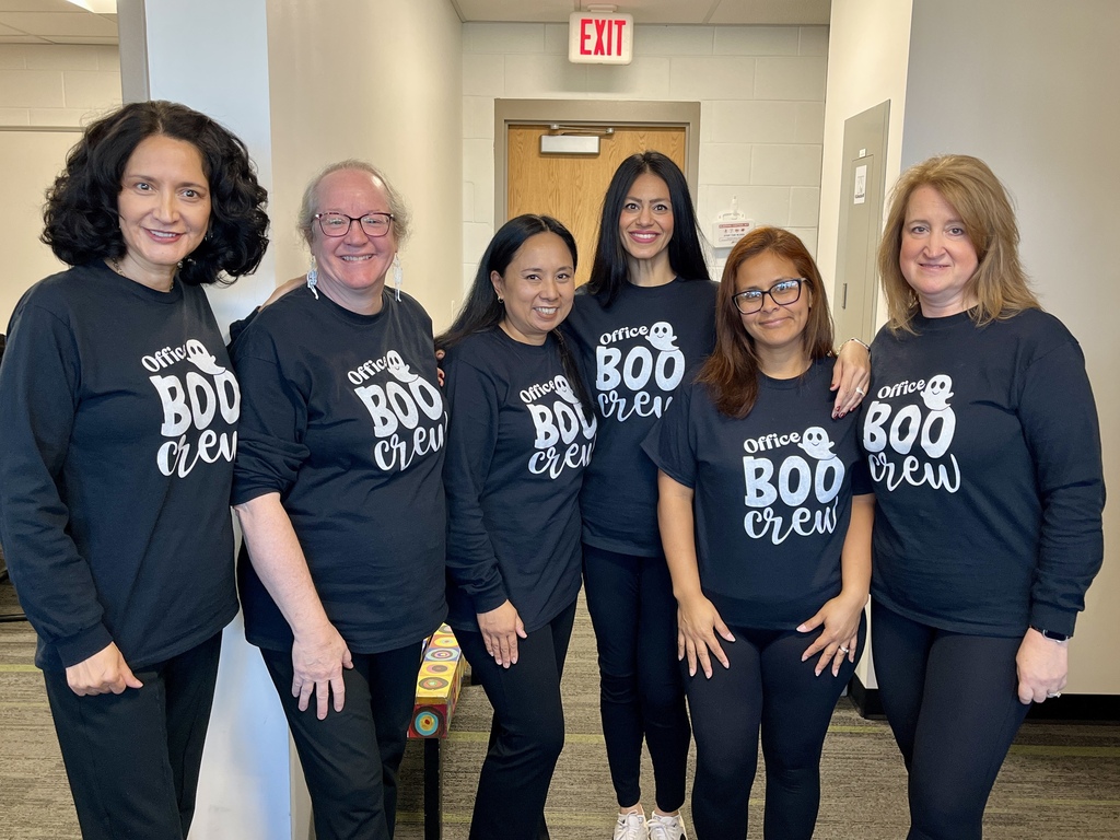 Elementary Office Staff with matching "Office Boo Crew" shirts