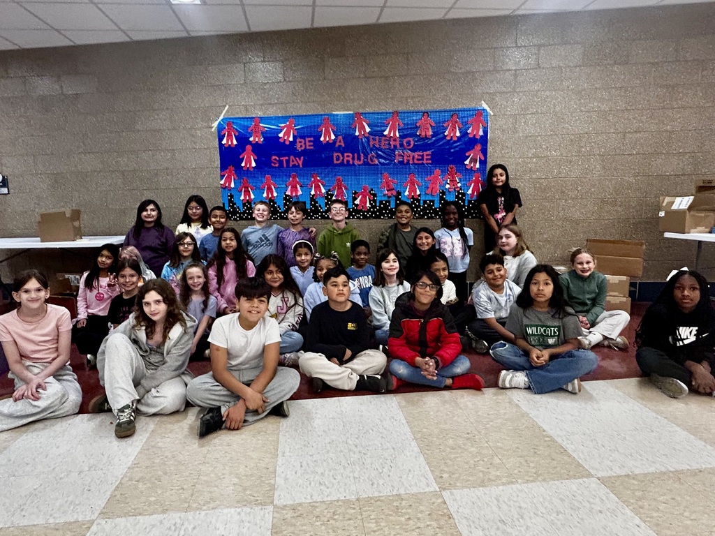 Group Photo - PBIS Student Leaders pose with their completed Red Ribbon Week banner