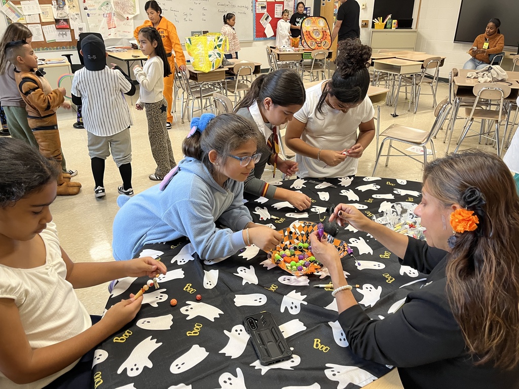 Students doing a craft at Fall Fest