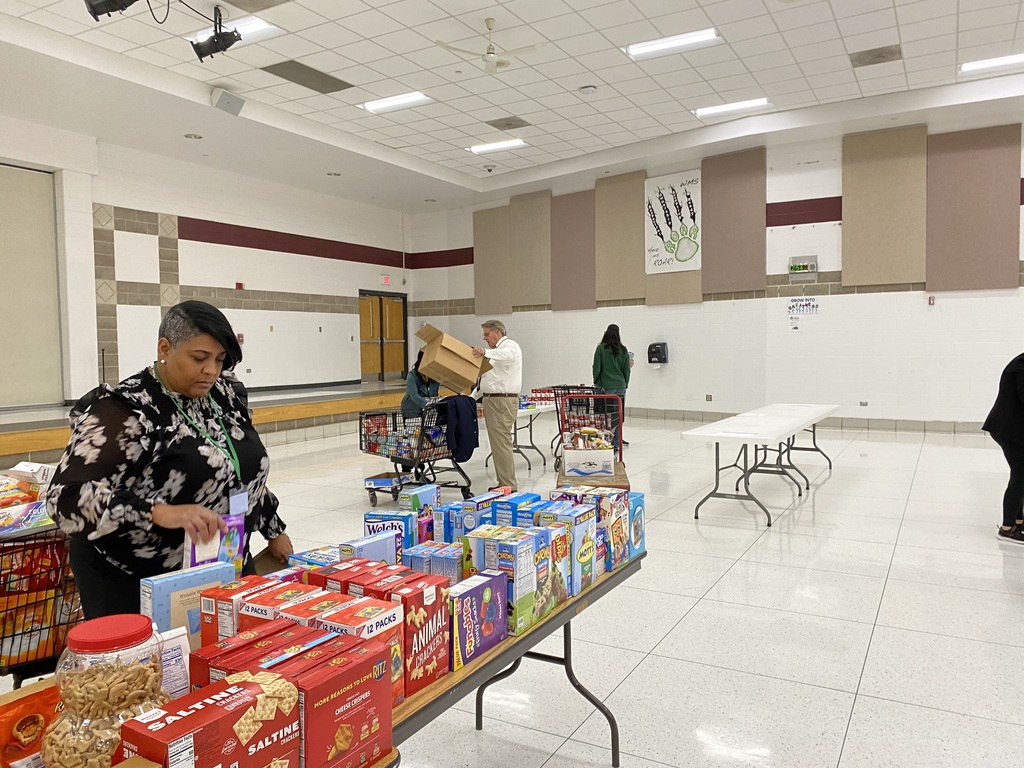 Food Drive Volunteers set up the Woodland Food Pantry