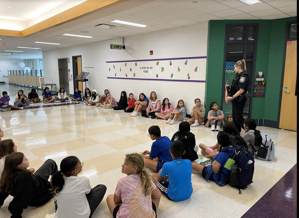 Officer Hansen address Student Leaders