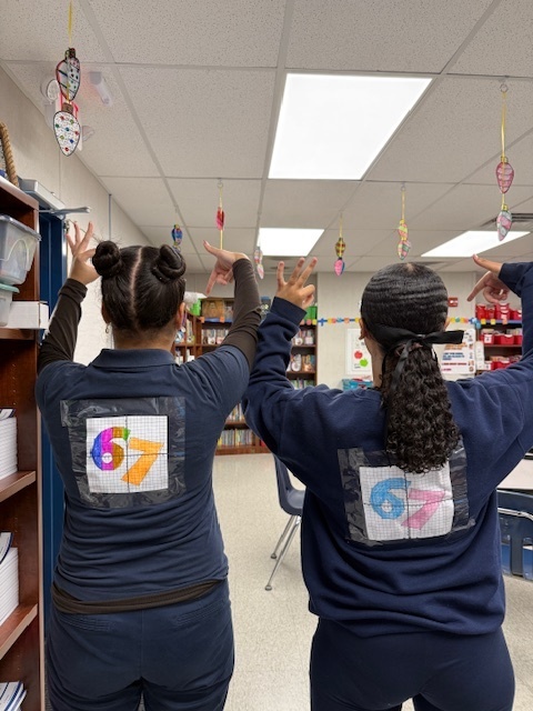 Students wearing their 67 graphs