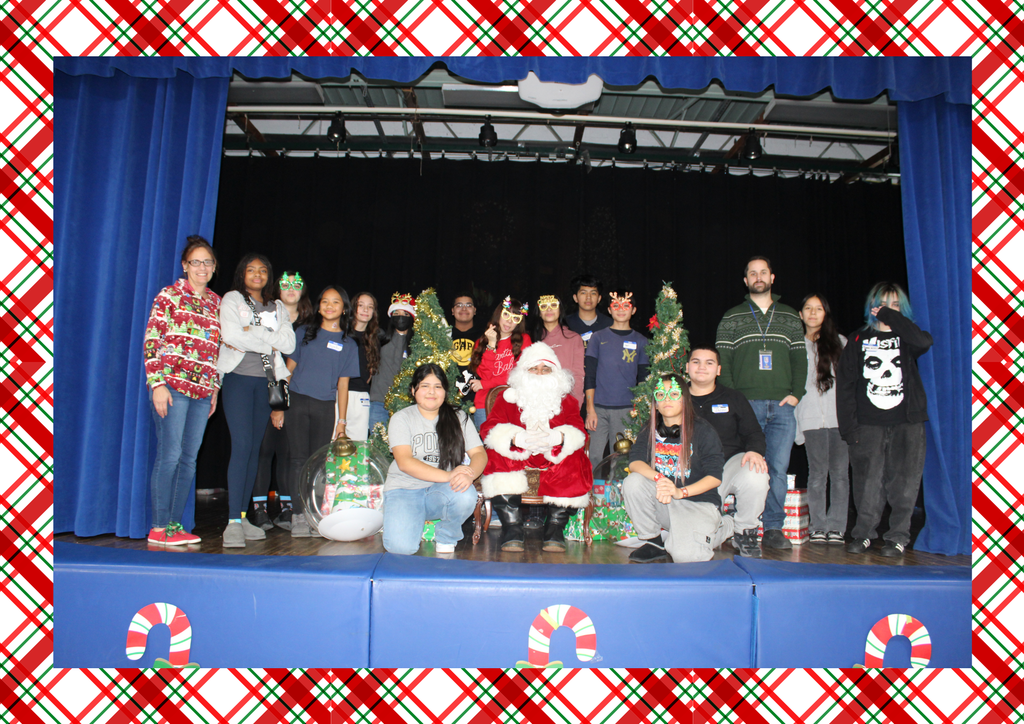 STudent council on stage with Santa