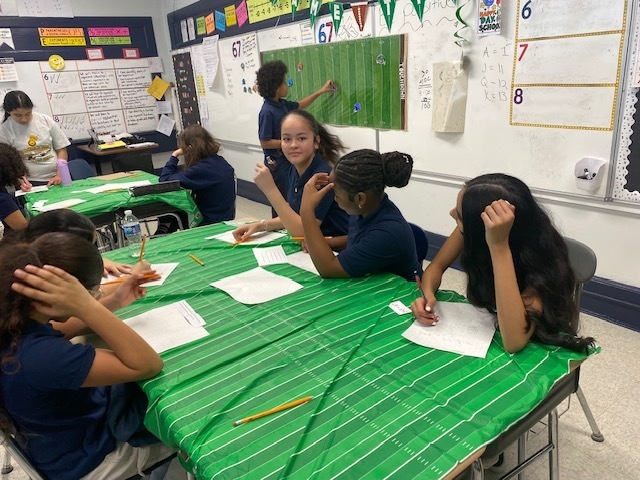 students doing football math