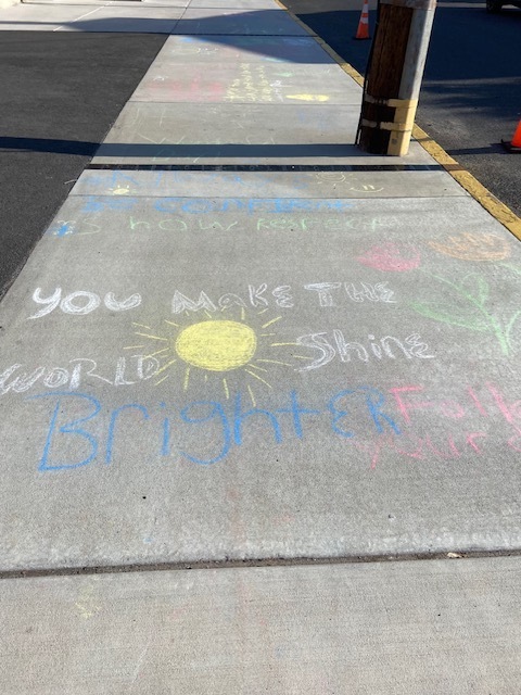 sidewalk chalk with positive message you make the world shine brighter