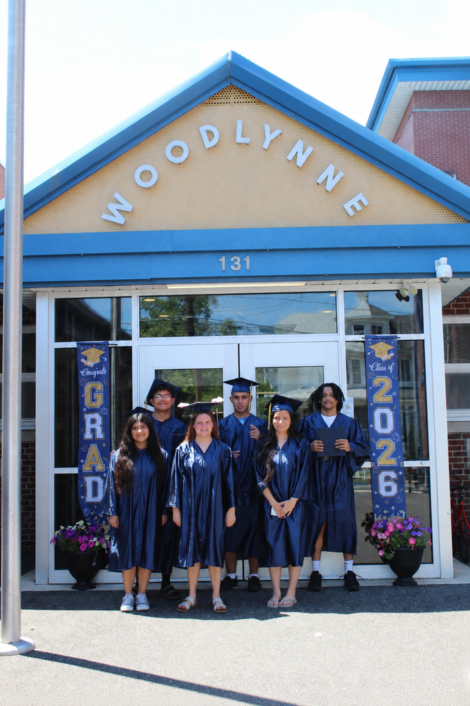 students in their gowns in front of Woodlynne Elementary