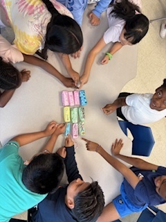 Students around their project they made in summer school