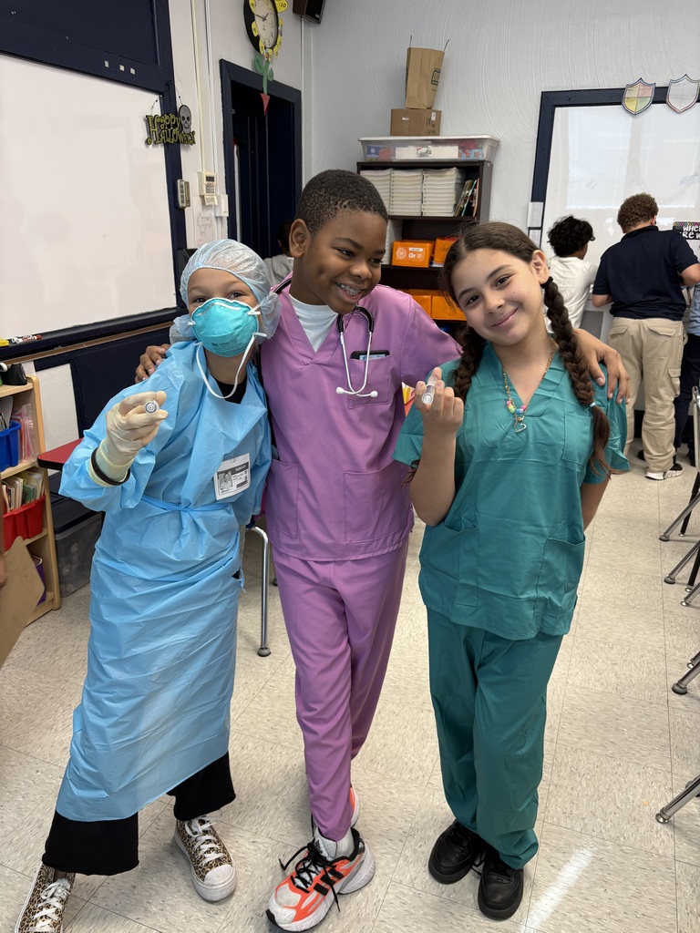 3 students dressed as hospital workers