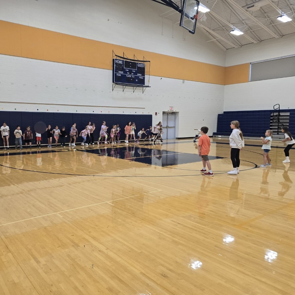 Cheerleaders and second graders playing sharks and minnows!