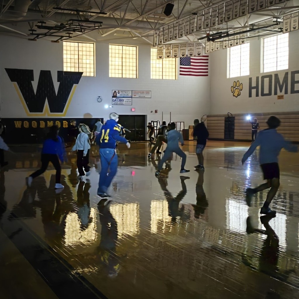 Students participating in a relay - in the dark!