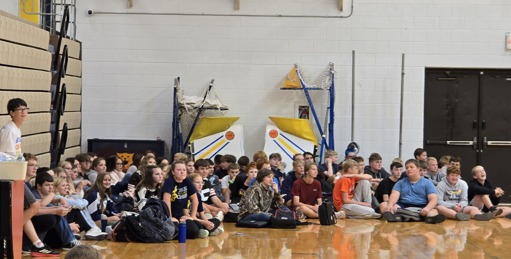 Freshmen waiting in their corner of the gym for the next item to be announced for the Scavenger Hunt