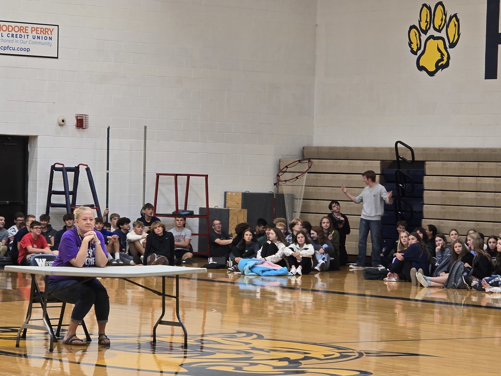 Sophomores waiting in their corner of the gym to hear what they need next for the Scavenger Hunt