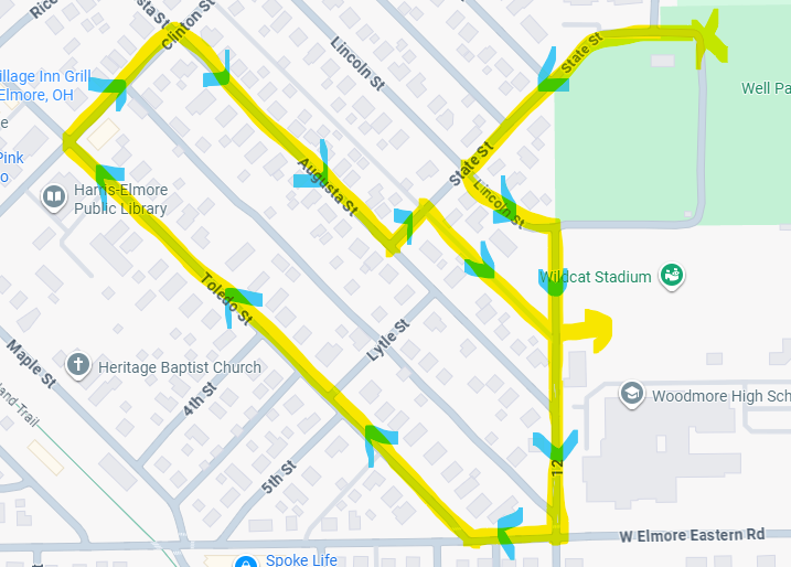 Parade Route: Start at well park, go southwest down State St, turn left on Lincoln, then turn right on the alley between the Stadium and the water tower. Continue to Fremont and take a right on Fremont, then another right on Toledo St. Continue down Toledo St to Clinton where you make another right on Clinton. After two blocks, take a right on Augusta St, then a left on State St. Take an immediate right onto the alley and then head into the stadium.