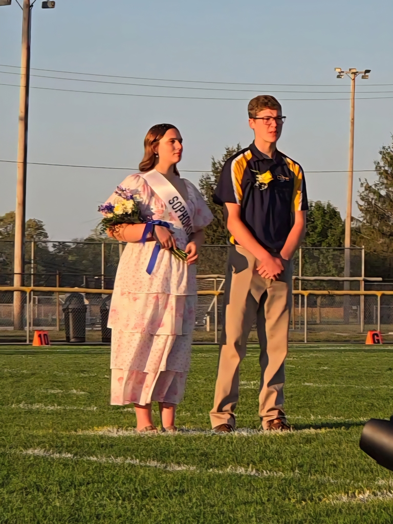 Sophomore Attendants being introduced on the football field