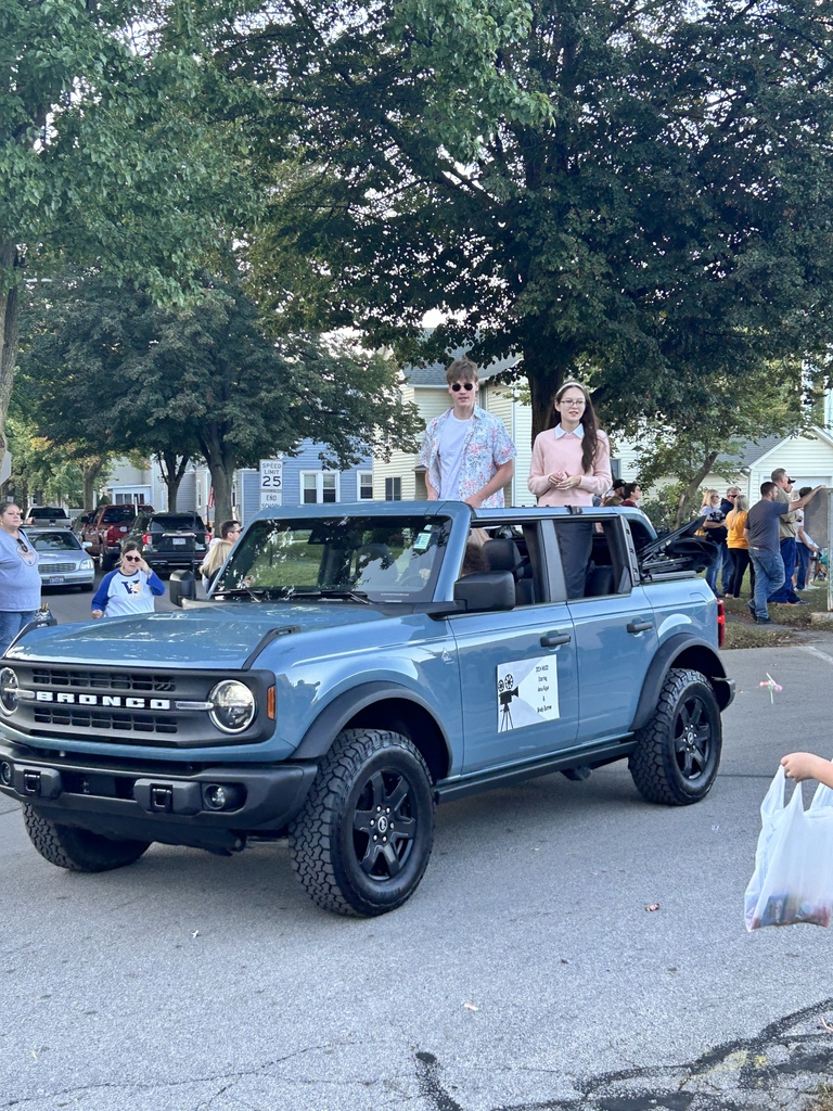 2024 Homecoming King and Queen riding in the parade