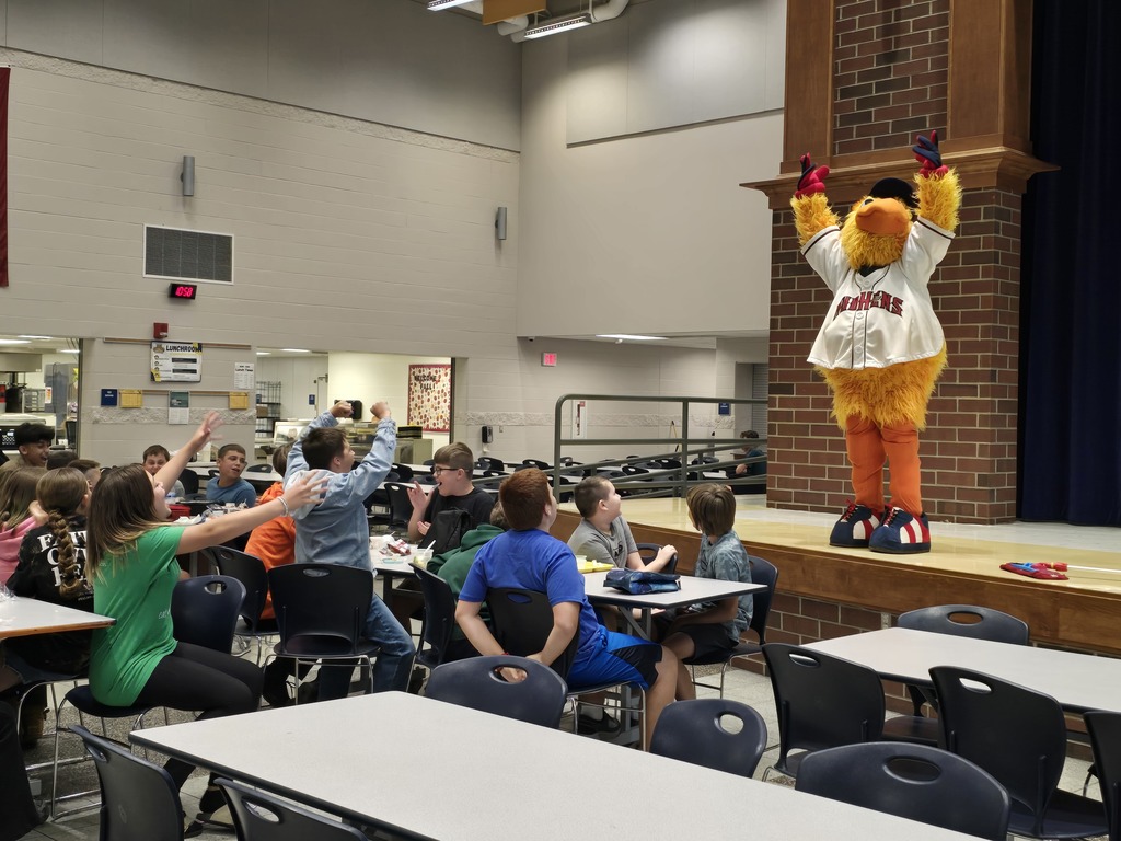 Muddy getting all of the students in the lunch room pumped up!