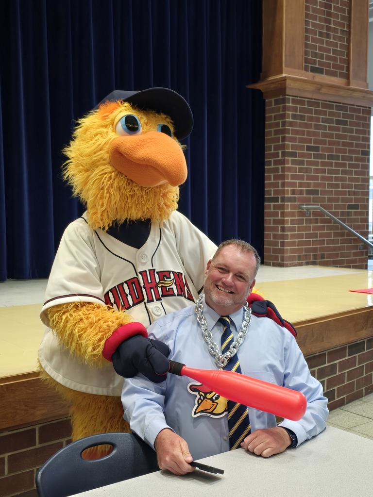 Mr. Barrett and Muddy posing for a picture