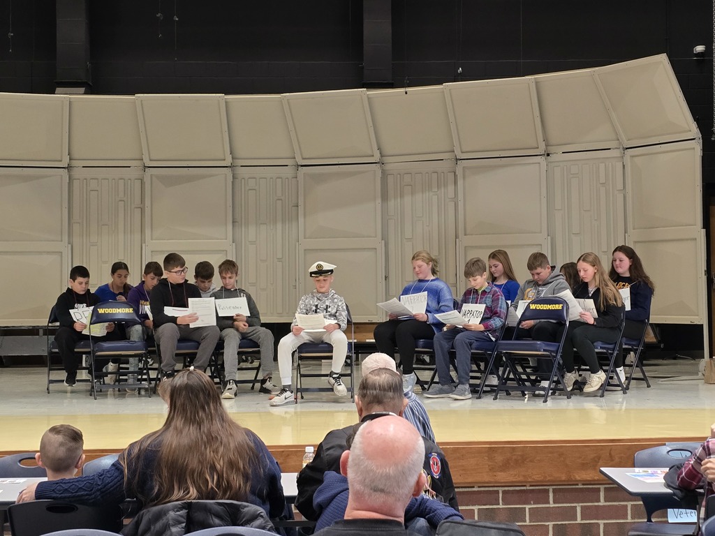 The seventh grade Enrichment Class performs a Reader's Theater dedicated to Veterans.