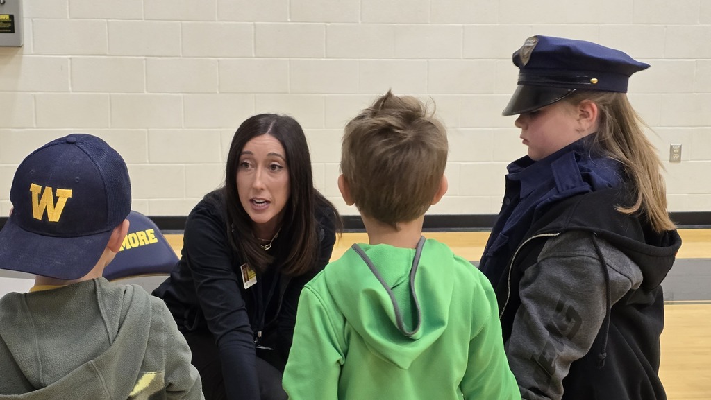 Students listening to Pediatric PTA speak about her career