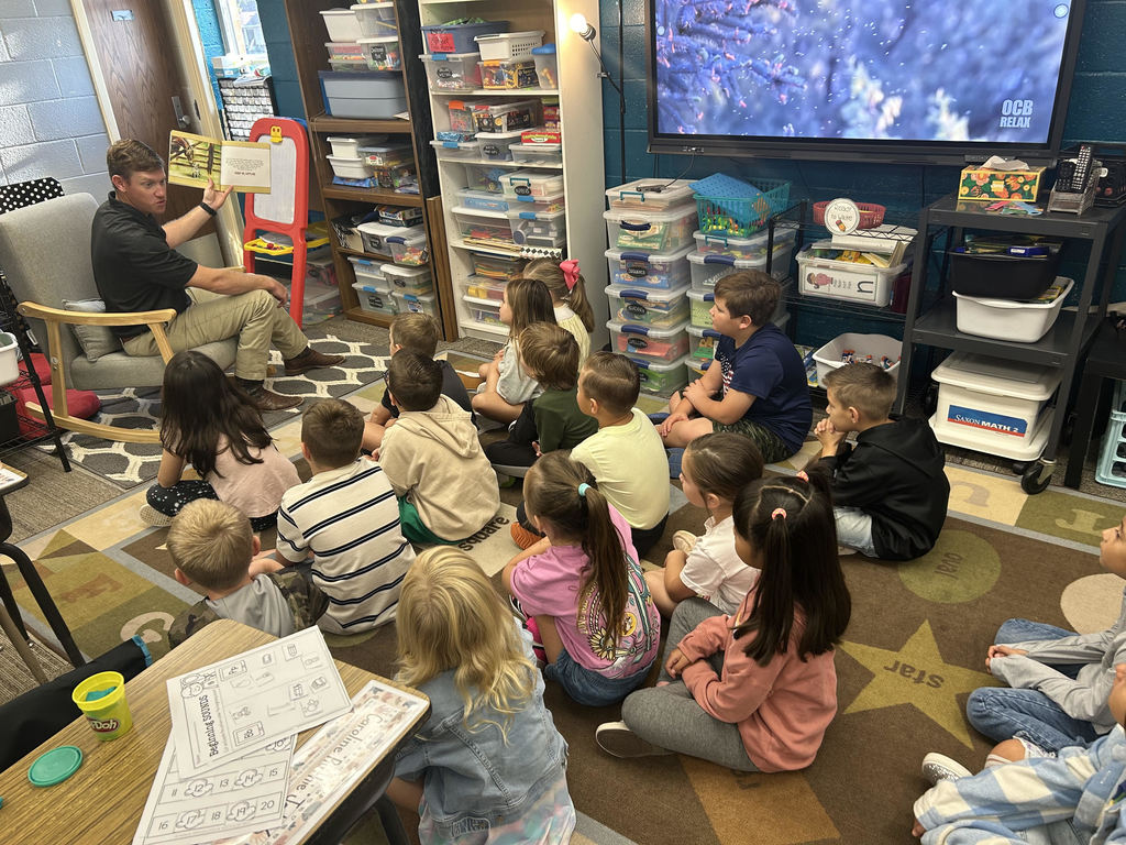 Mr. Vanderwork reading to First graders Levi's Lost Calf
