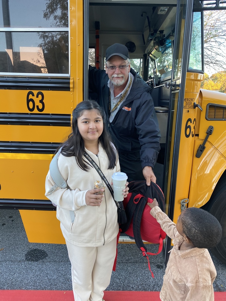 student with bus driver