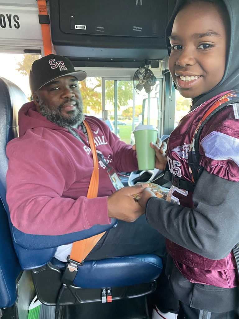 student with bus driver
