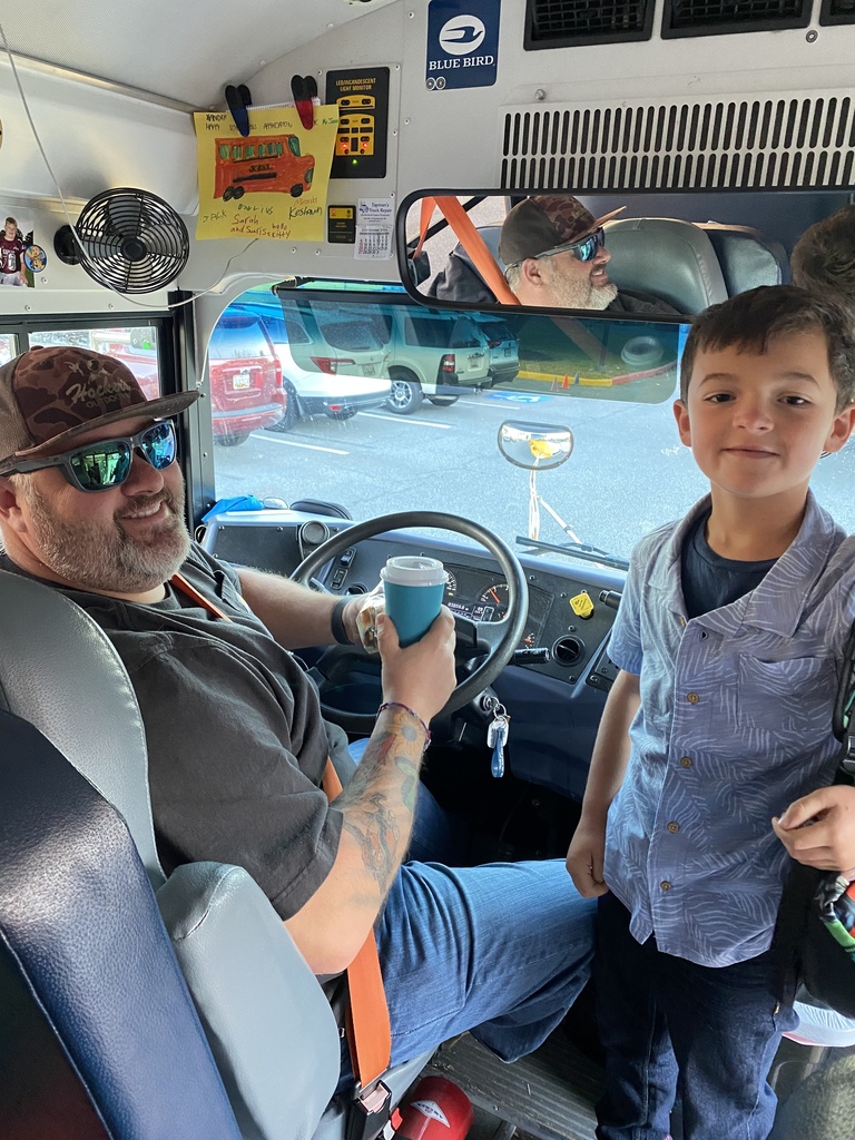 student with bus driver