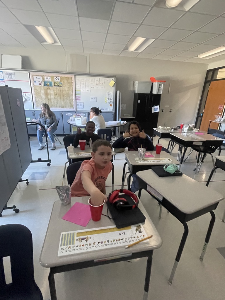 Students enjoying snacks, popcorn and a movie!