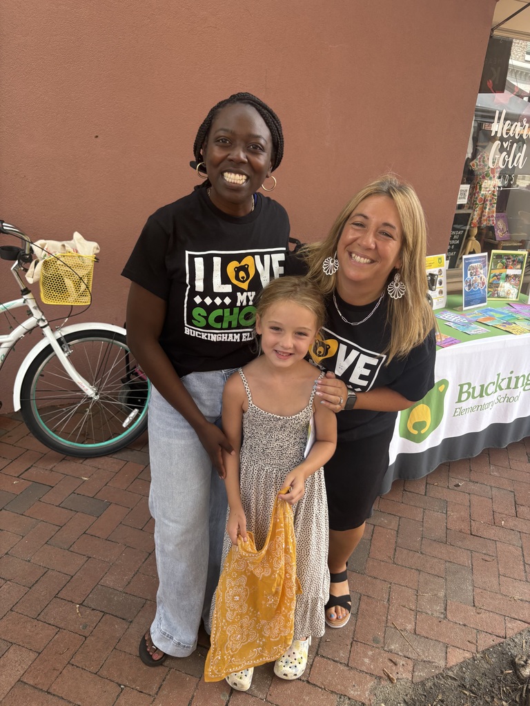 Dr. Jackson and Mrs. Miller with a student